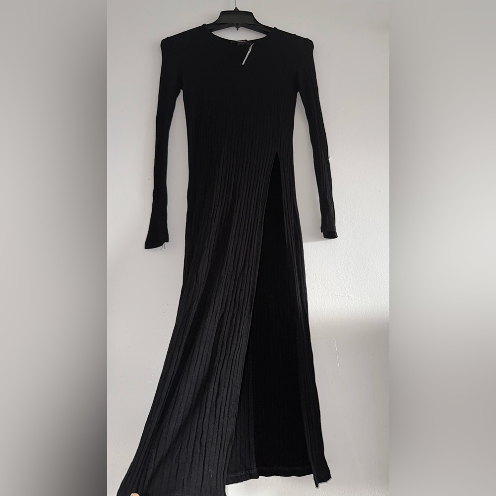 Black size S long sleeve knit material bodycon dress with leg slit new with tags